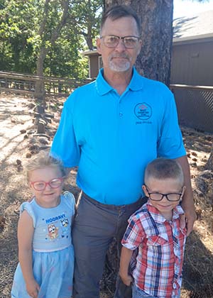 Jimmy Lawrence from Next Chapter Home Inspections, pictured with his two children.